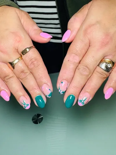 Teal and pink almond nails with hand-painted flowers